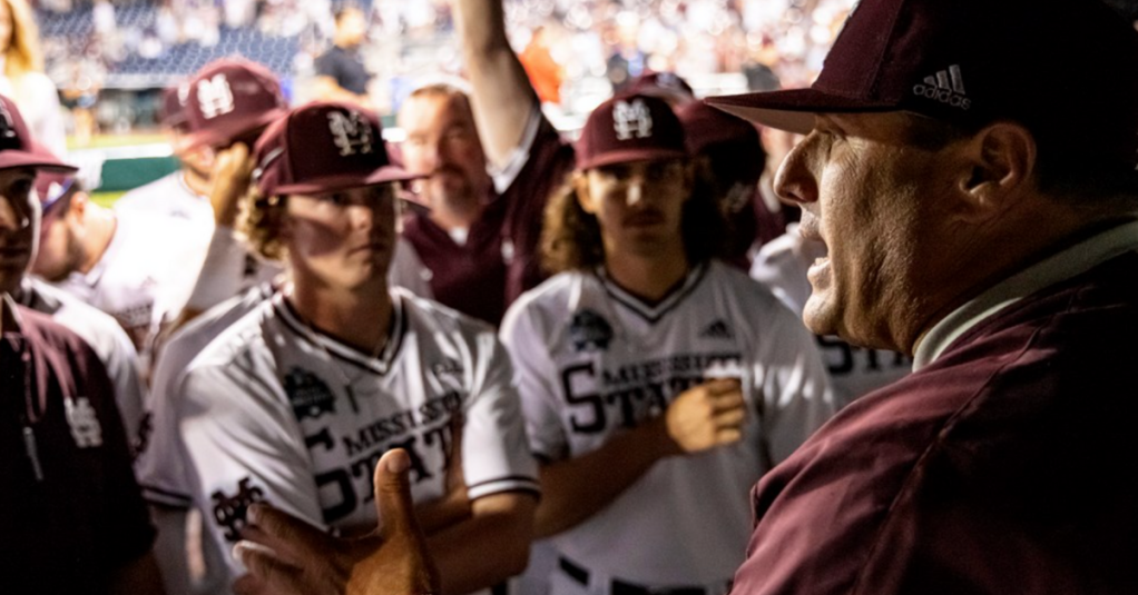 OMAHA, NE - June 29, 2021 - Mississippi State Head Coach Chris Lemonis speaks to the team in the dugout after game 2 of the 2021 Mens College World Series national championship series between the Vanderbilt Commodores and the Mississippi State Bulldogs at TD Ameritrade Park in Omaha, NE. Photo By Austin Perryman
